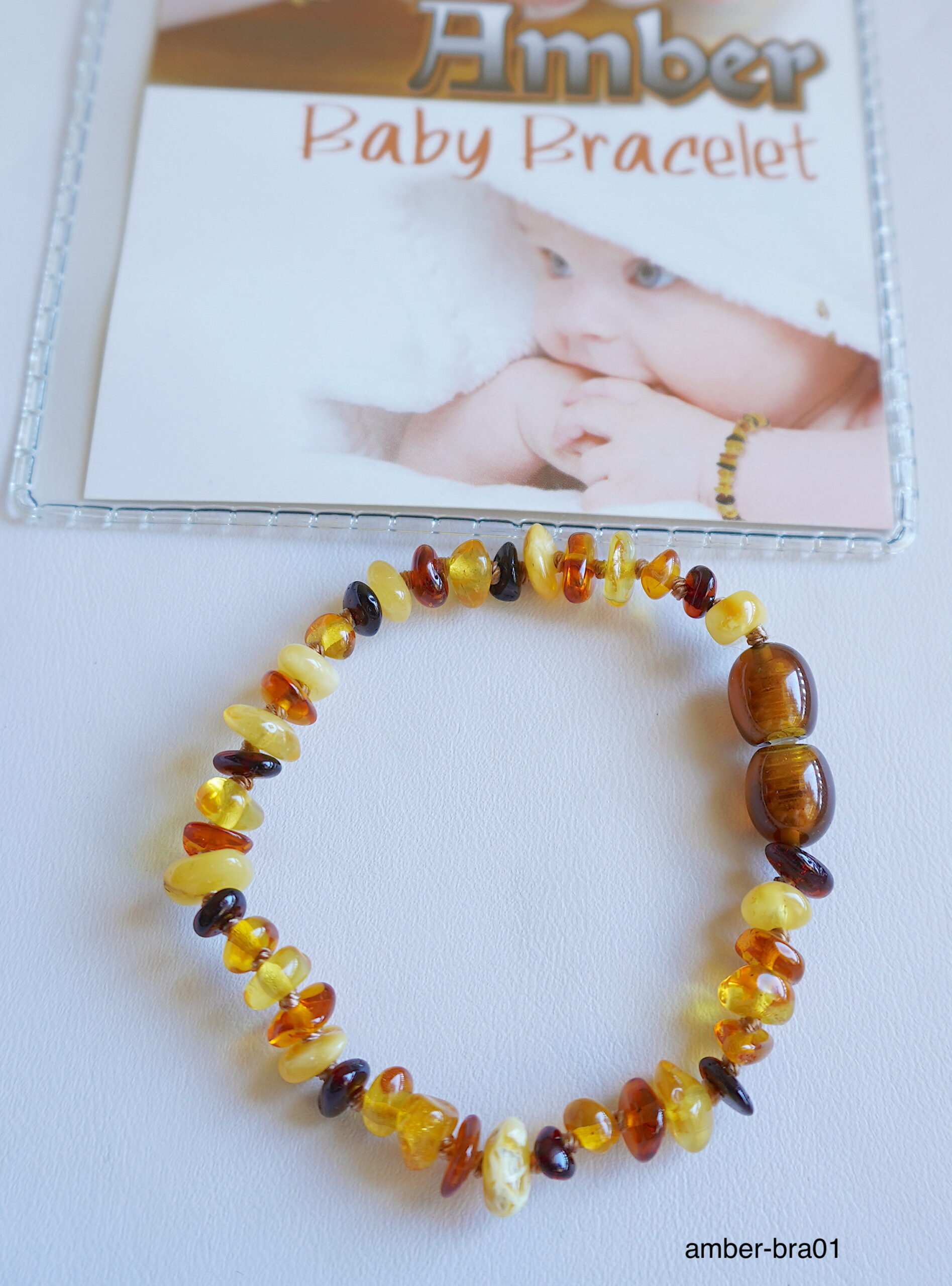 Baby J's - Honey Coloured Bracelet/Anklet - Premium Amber Bracelet -  Handcrafted with 100% Baltic Amber - Fitted with a Safety Screw Clasp -  Knotted to Prevent Scattering - 11cm : Amazon.co.uk: Fashion