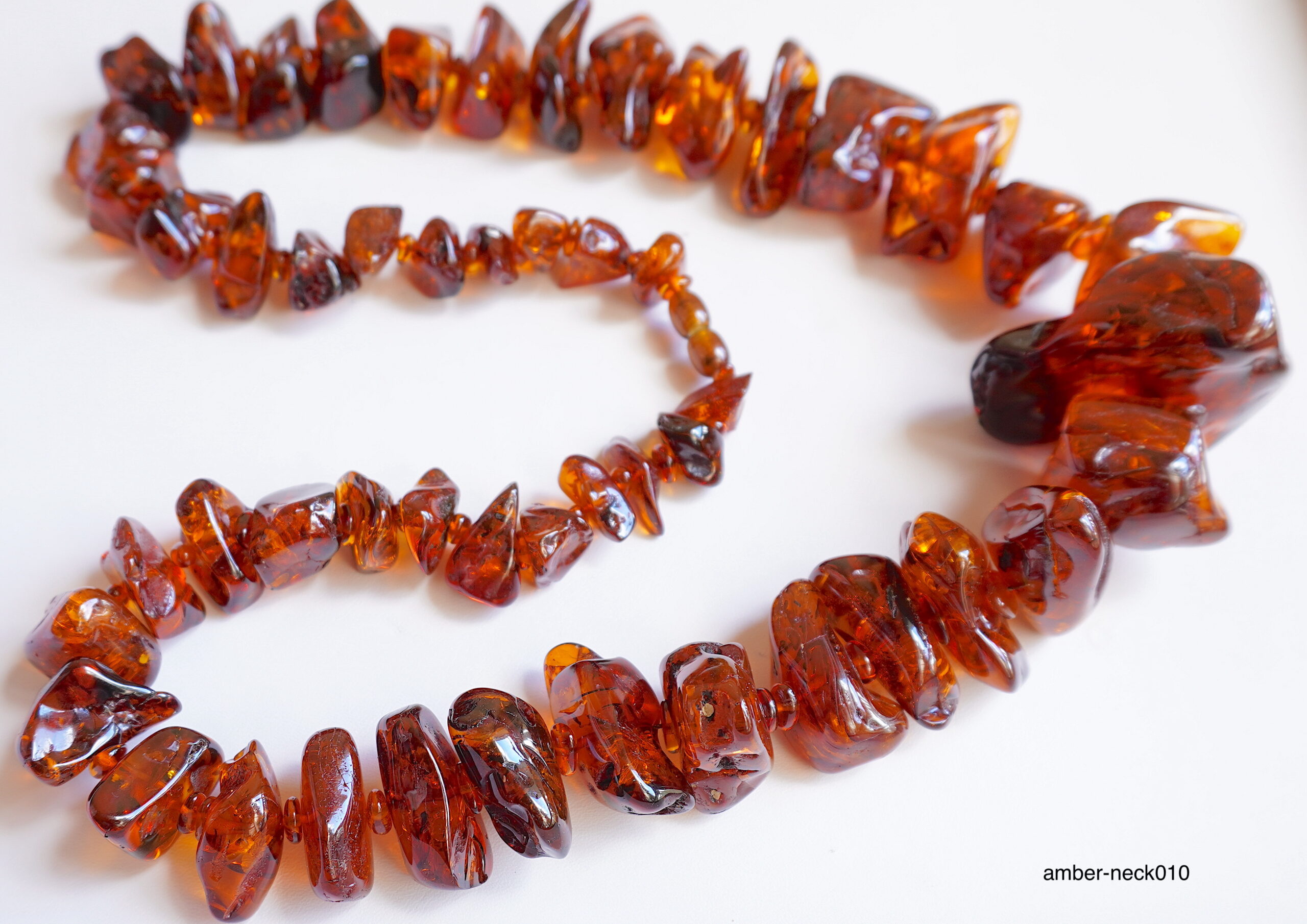 Red amber outlet beads