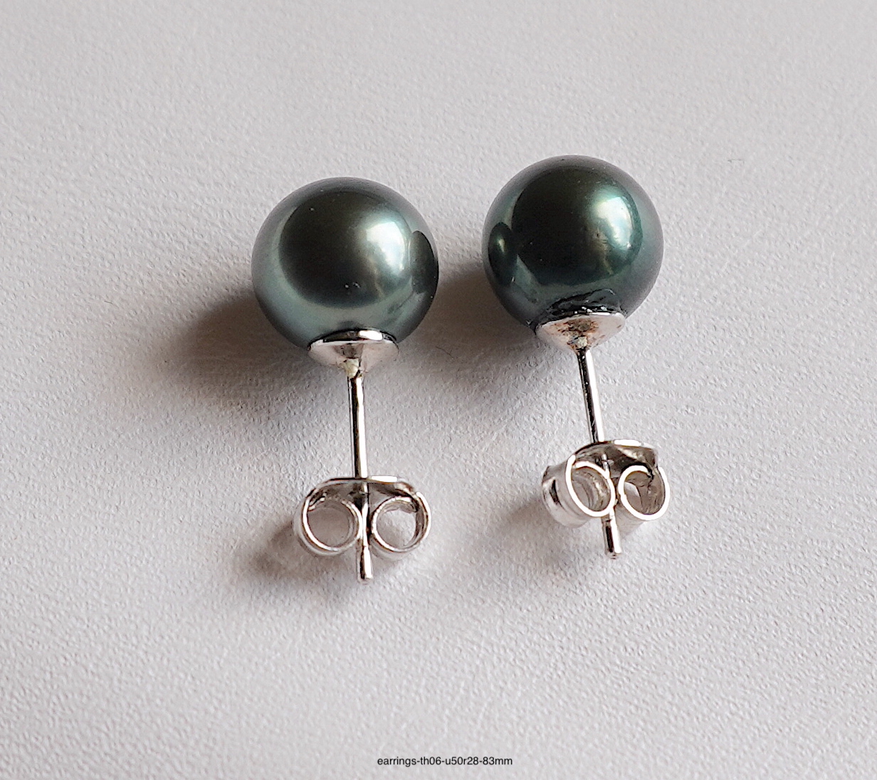 Tahitian pearl earrings dark green round 89mm on sterling silver settings   Melbourne Pearls